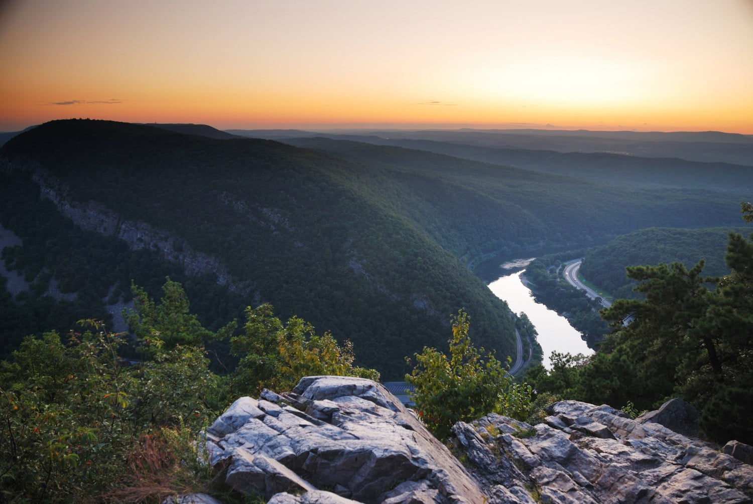 A green valley with a winding river