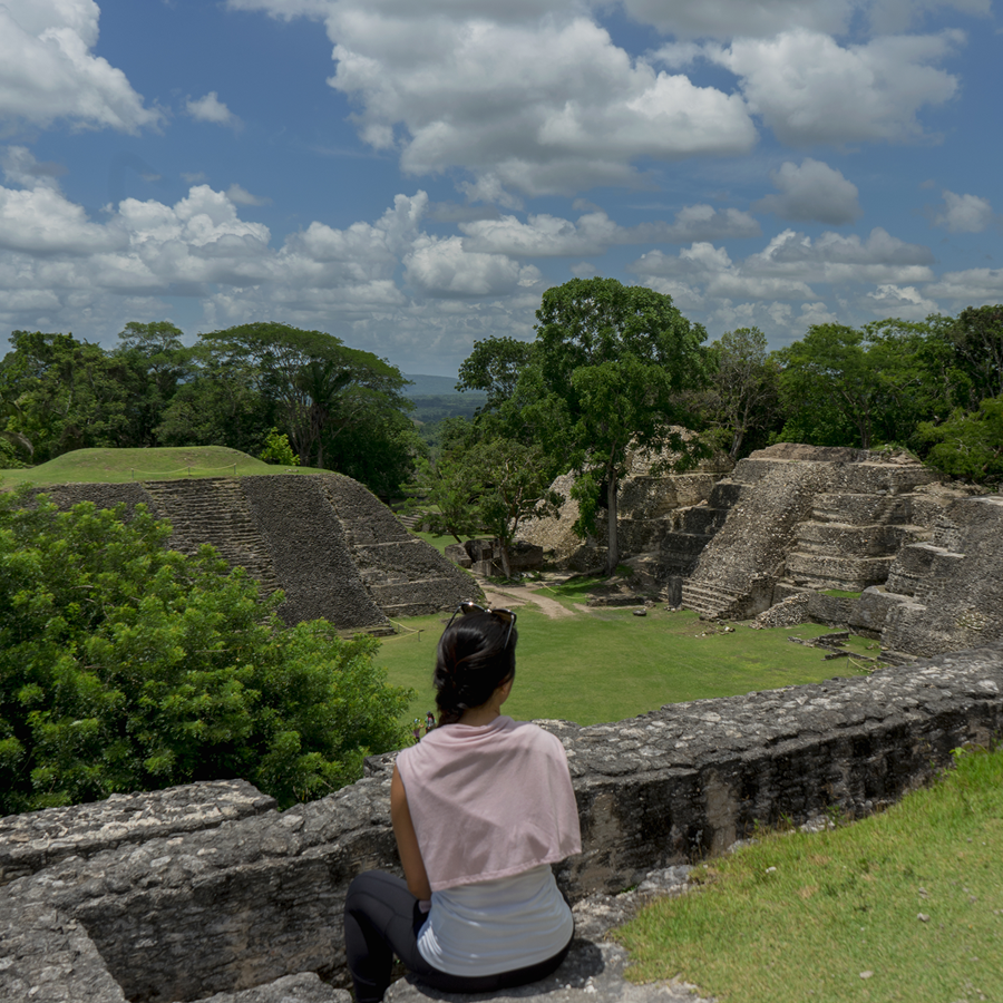 Traveler exploring a Maya archaeological site in Belize