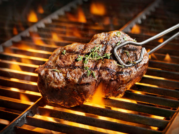 Steak coming off the grill