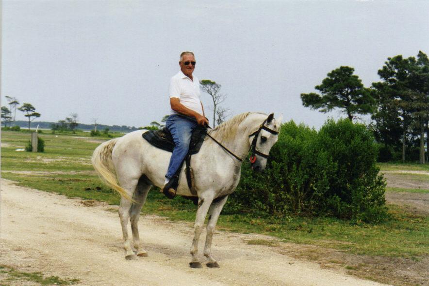 Don Leonard, founder of the Refuge Inn, riding on Chincoteague.