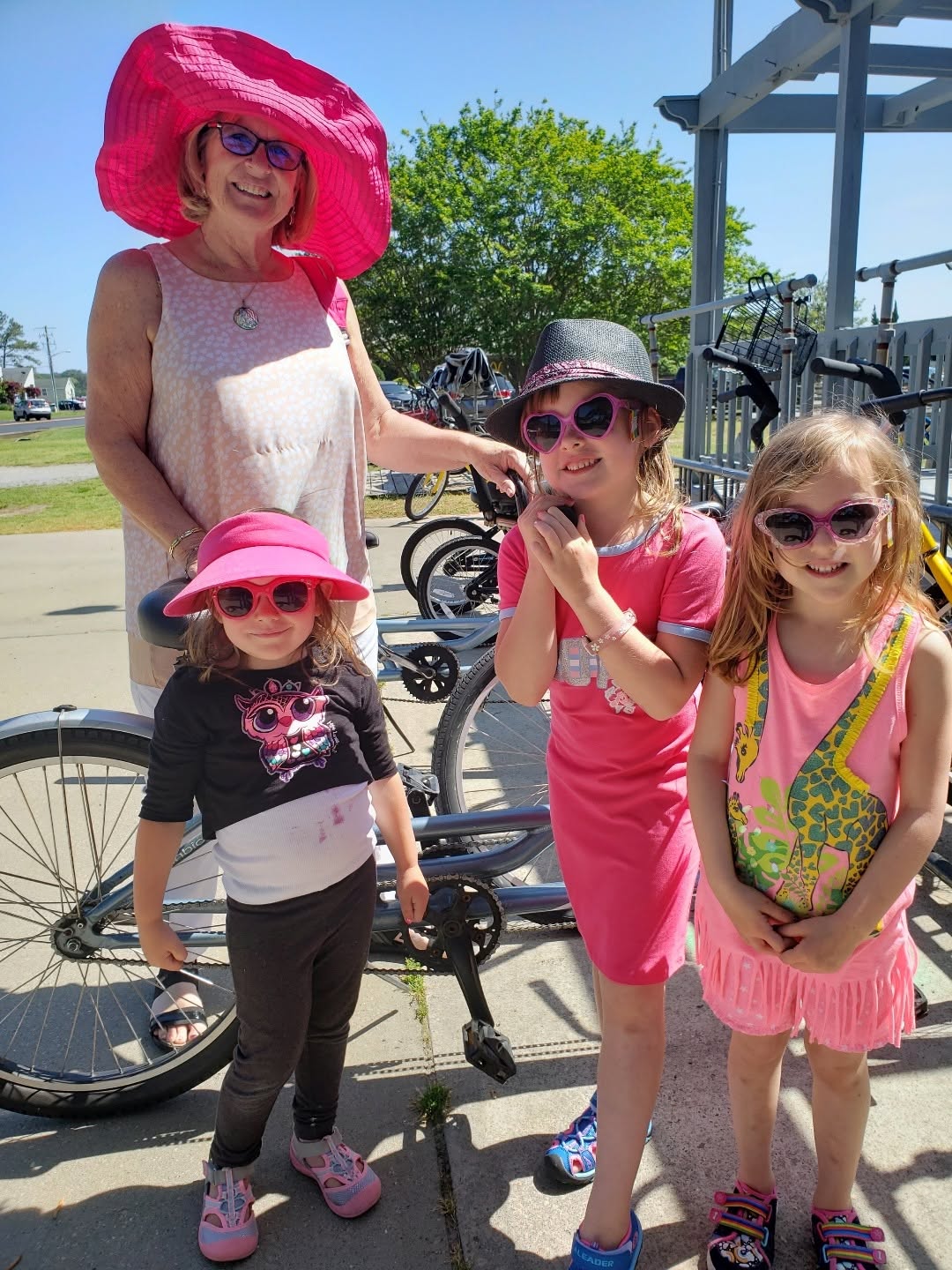Jane Wolffe — Gigi to her grandchildren — with some of her grandchildren and nieces beside rental bikes from the Bike Depot at the Refuge Inn, Chincoteague Island.
