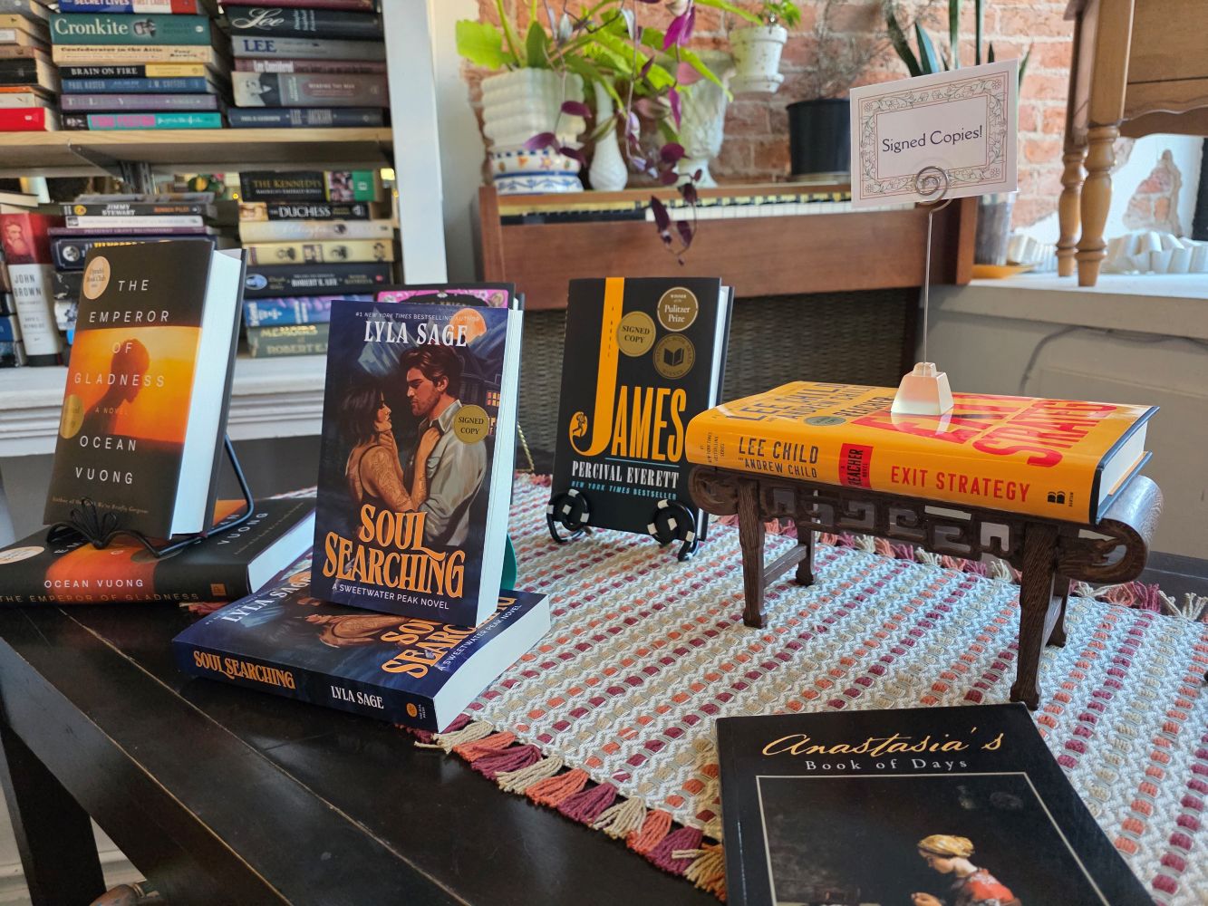 signed books on a table
