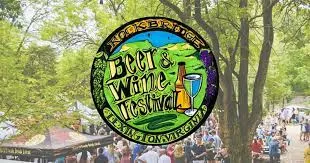 people walking around tents set up with rockbridge bear and wine festival logo people walking around tents set up with rockbridge bear and wine festival logo