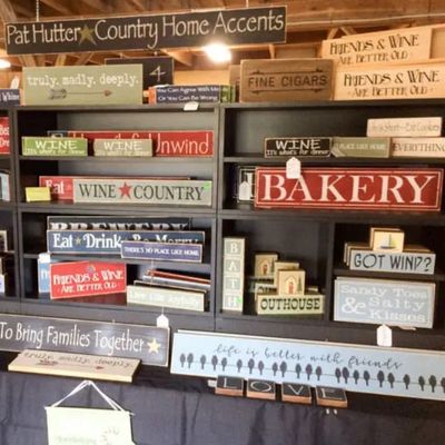 distressed sign display at the willow flea market in maine