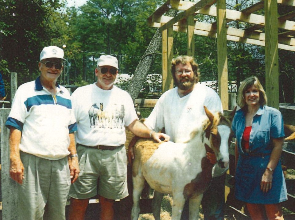 Refuge Inn founder Don Leonard with three of his children — Carlton, Arthur and Jane — and the buyback colt that would become the original Don Leonard Stud.